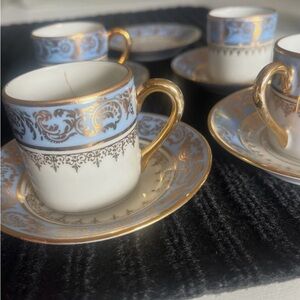 Vintage blue floral Limoges demitasse In used condition.